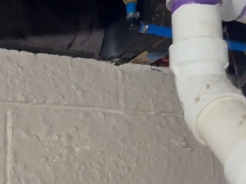 Frozen pipe repair area with insulation or thawing work for PEX repair of a frozen split