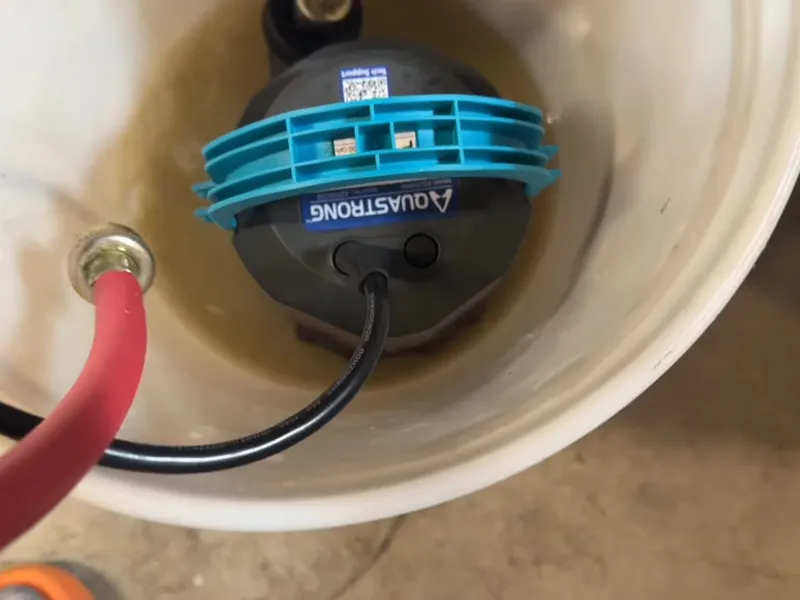 Garbage disposal mounting and under-sink drain connection for Clearing a jammed disposal