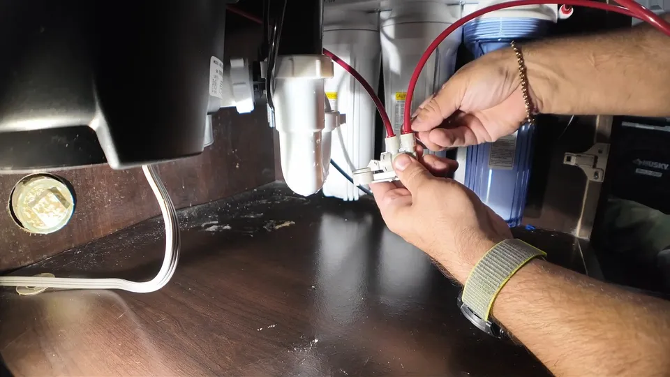 Garbage disposal mounting and under-sink drain connection for New disposal installed and tested