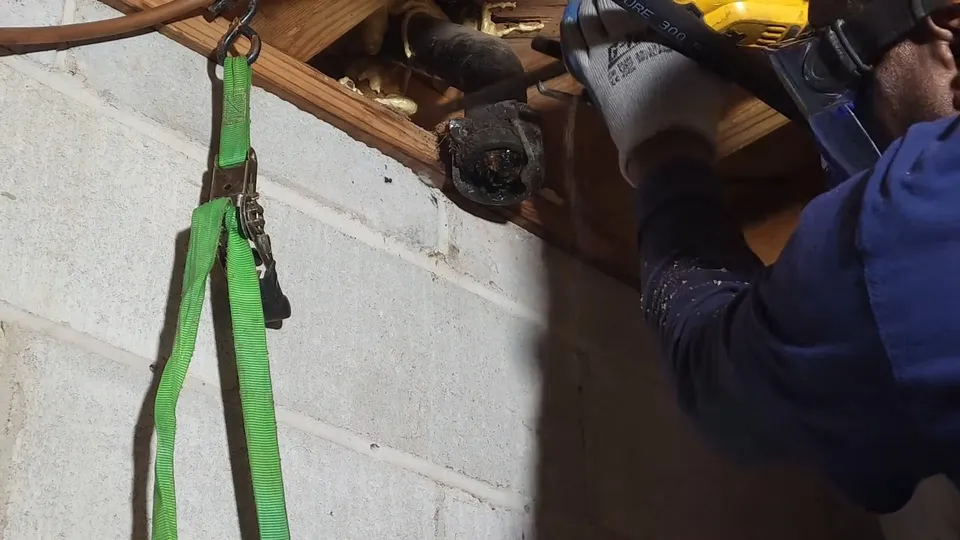 Sewer pipe, trench, cleanout, or cast iron repair area for Plumber repiping an Englewood home with PEX