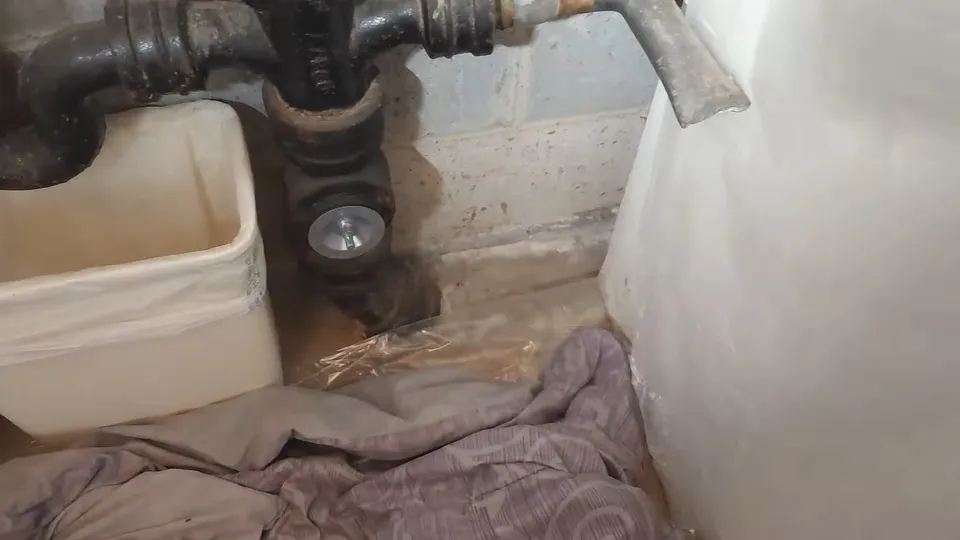 Sewer pipe, trench, cleanout, or cast iron repair area for Parker plumber repiping an established Cottonwood home with PEX