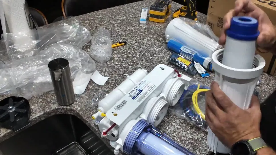 Under-sink reverse osmosis filters and tubing for Hard water scale on a Parker faucet