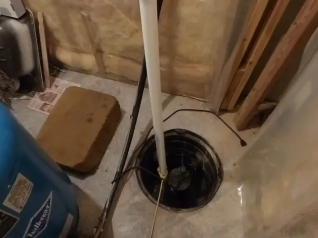 Sump pump pit, basin, and discharge piping for Parker basement sump pit and water heater