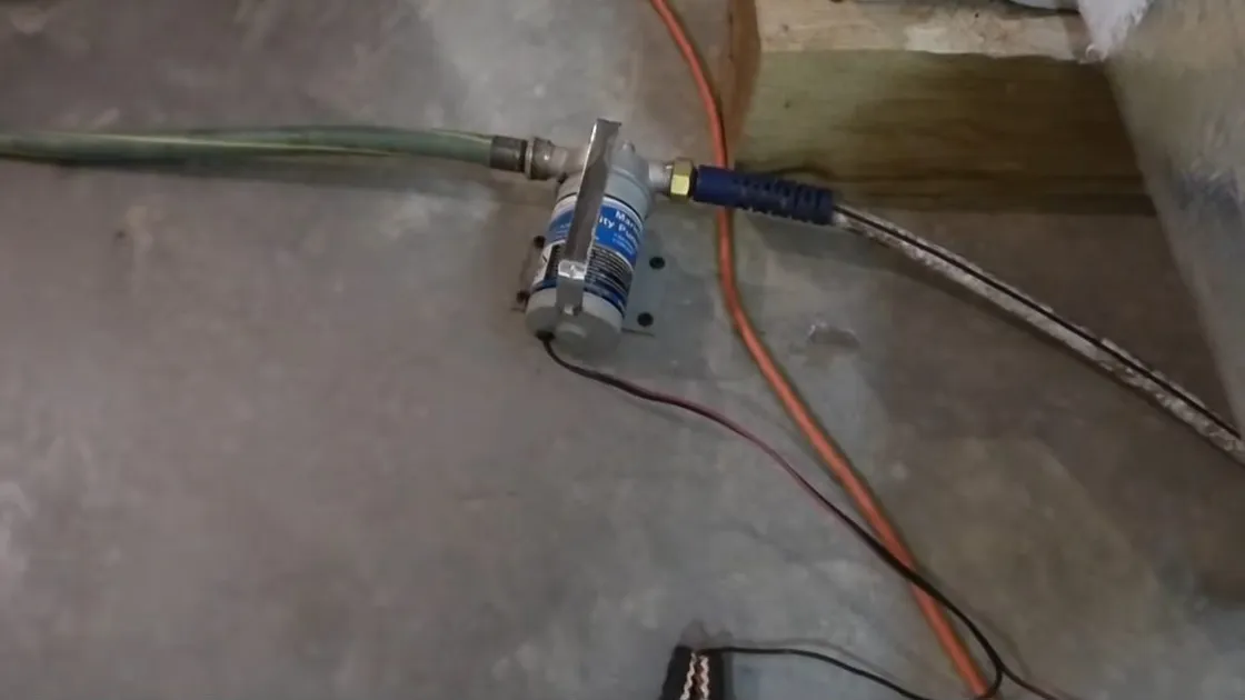 Sump pump pit, basin, and discharge piping for Sump pump in a Parker basement pit