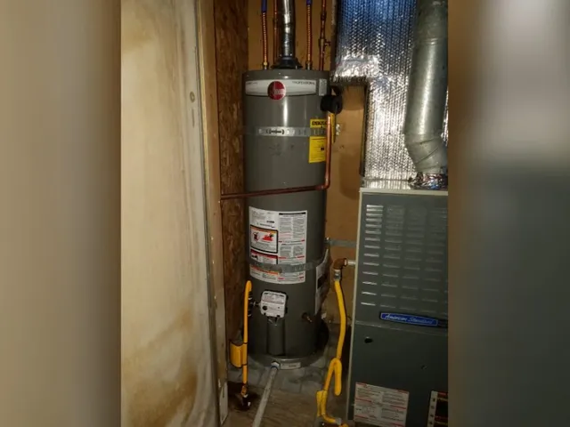 Tank water heater and plumbing connections for Auburn Hills