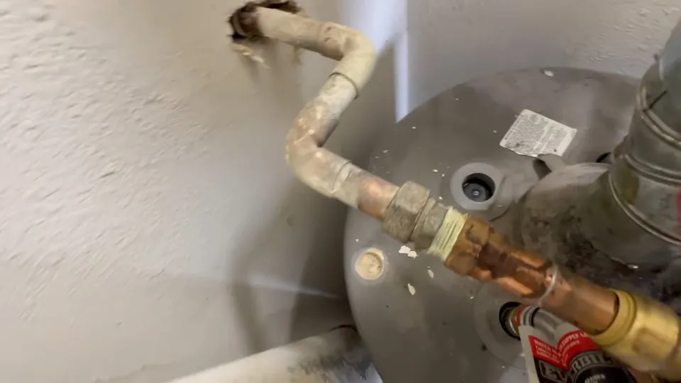 Tank water heater and plumbing connections for Commercial water heater replaced at a Parker Road business