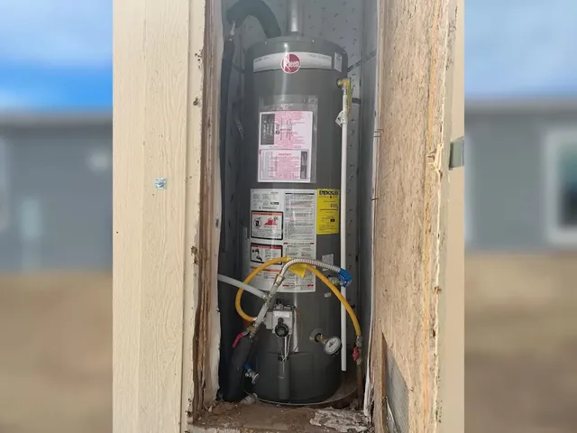 Tank water heater and plumbing connections for Idyllwilde