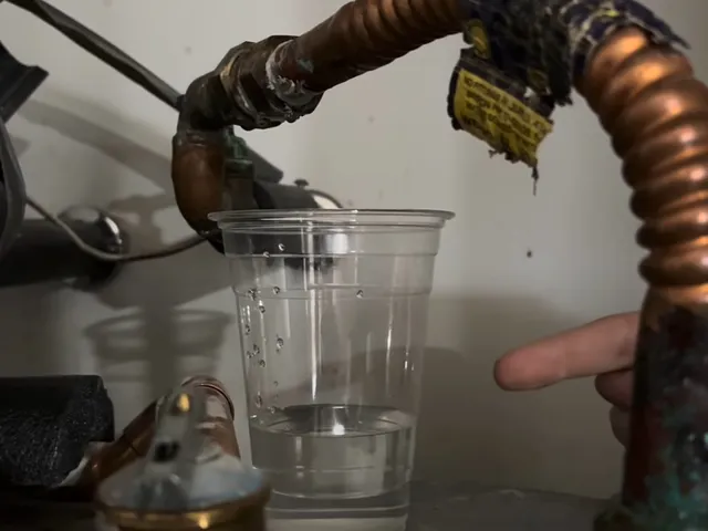 Tank water heater and plumbing connections for Water Heater Repair