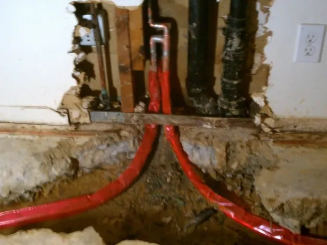 Tank water heater and plumbing connections for Lincoln Creek