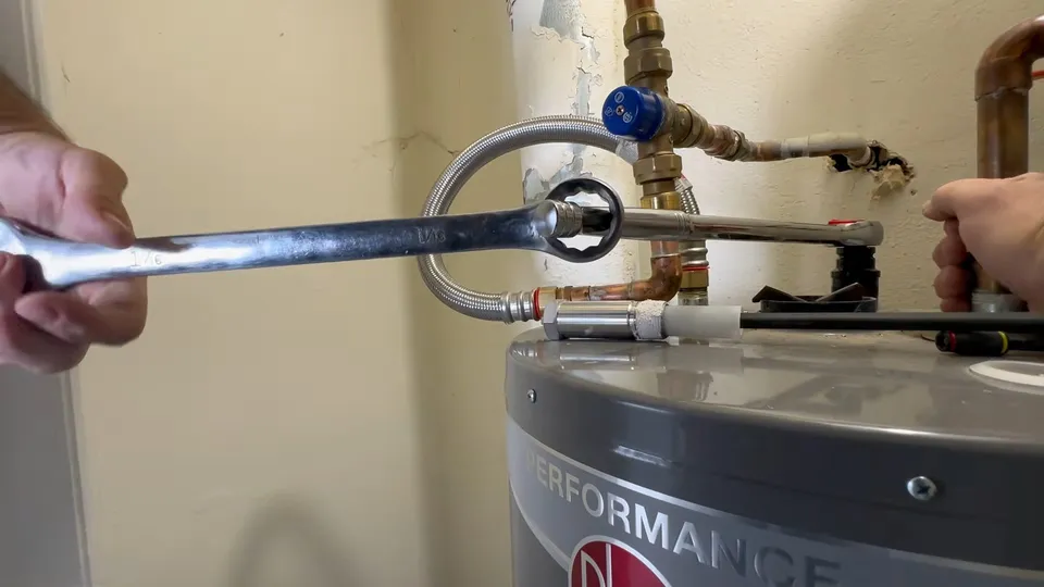 Tank water heater and plumbing connections for The Pinery custom homes on large lots near The Pinery Country Club