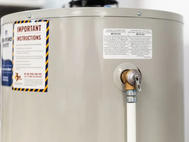 Tank water heater and plumbing connections for Sediment from a hard-water tank