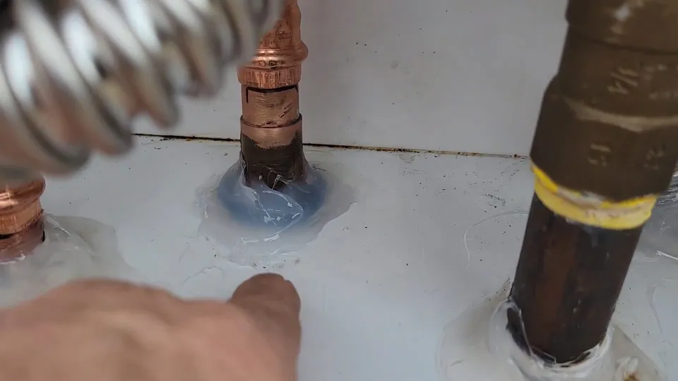 Tankless water heater valves and service hoses for Tankless descaling in a Parker home